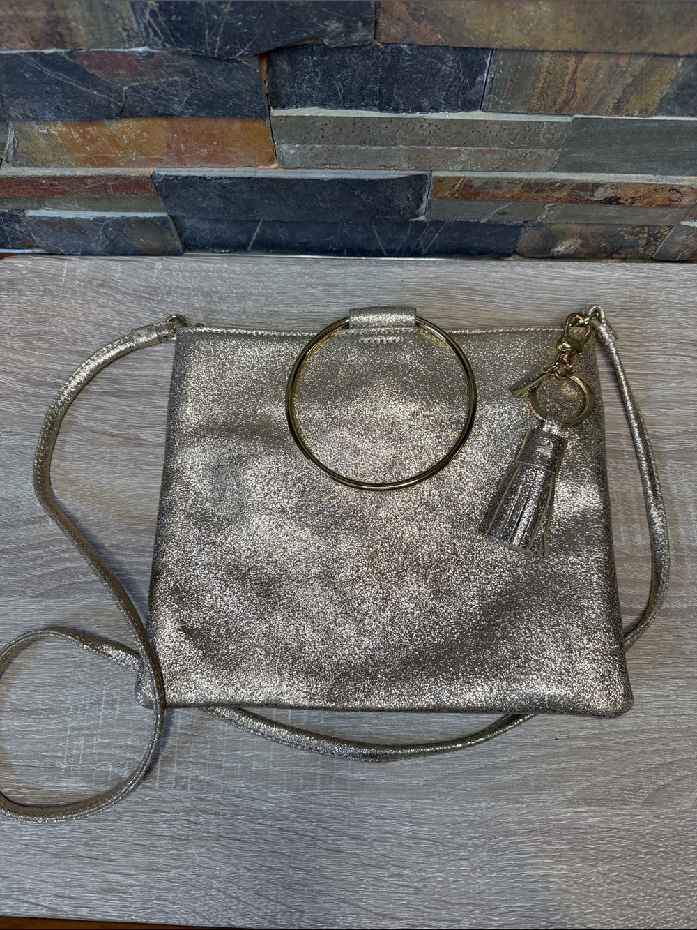 Thacker Metallic Gold Woman's Crossbody Bag with Tassel Accent